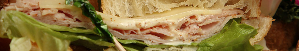 Eating Sandwich at Hoagie Bear Subs restaurant in Naranja, FL.
